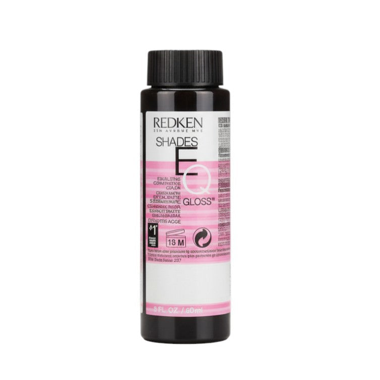 Redken Shades Eq hair color bottle on a white background