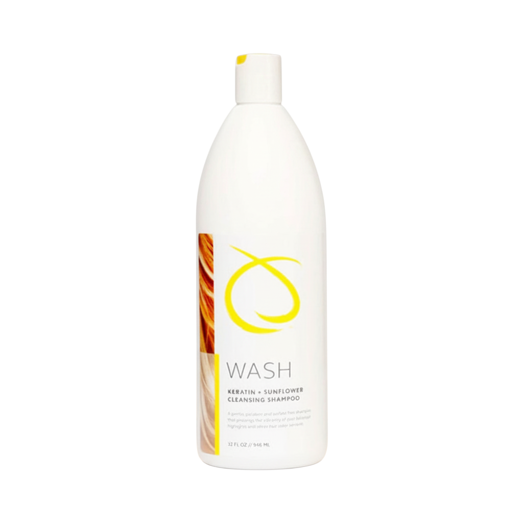 White shampoo bottle with a yellow logo on a white background