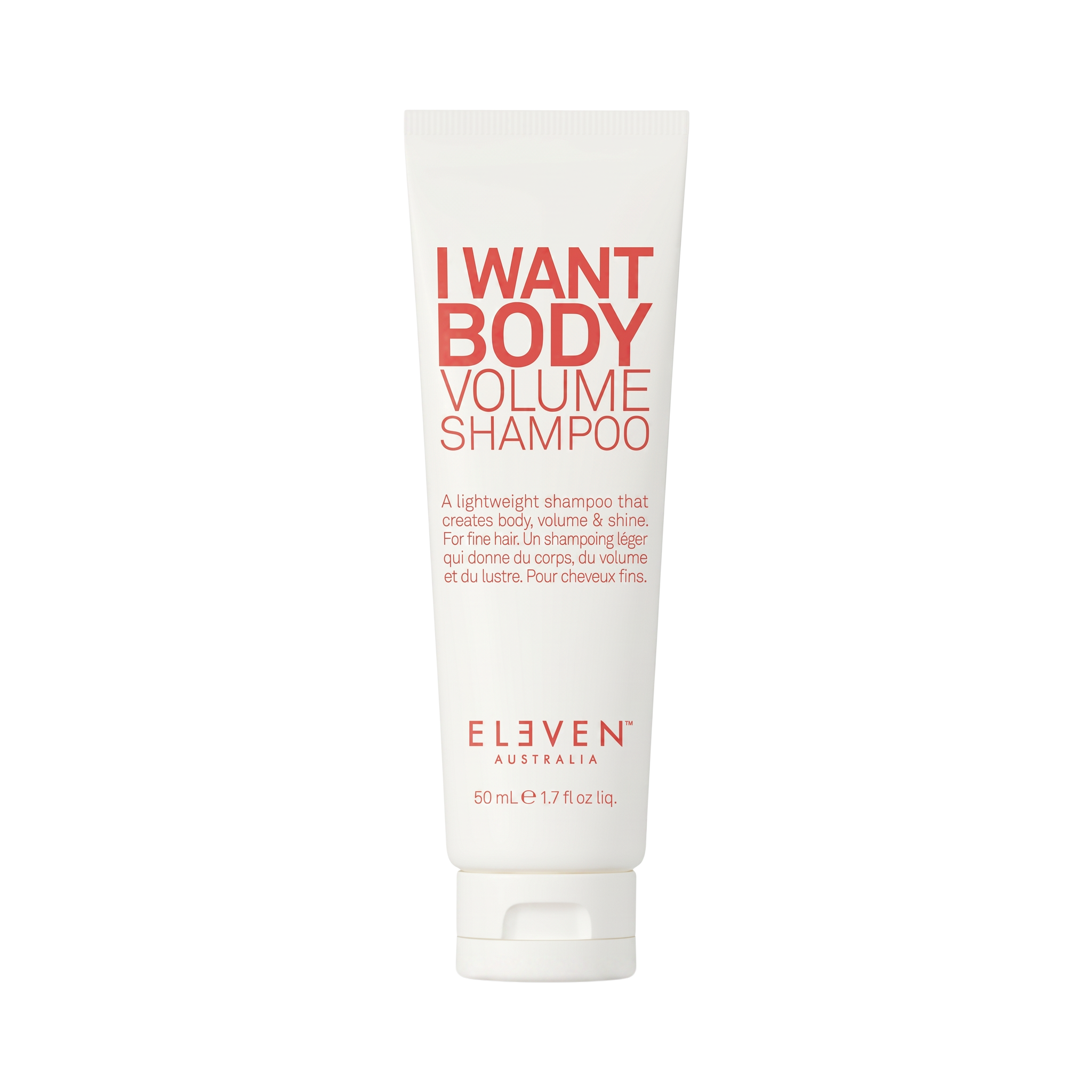 Shampoo bottle labeled 'I Want Body Volume Shampoo' by Eleven Australia on a white background