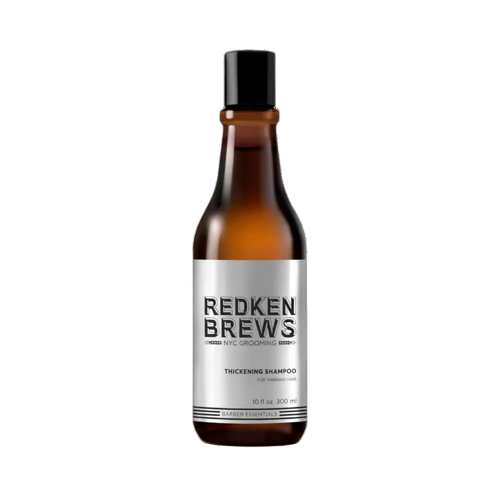 Redken Brews shampoo bottle on a white background